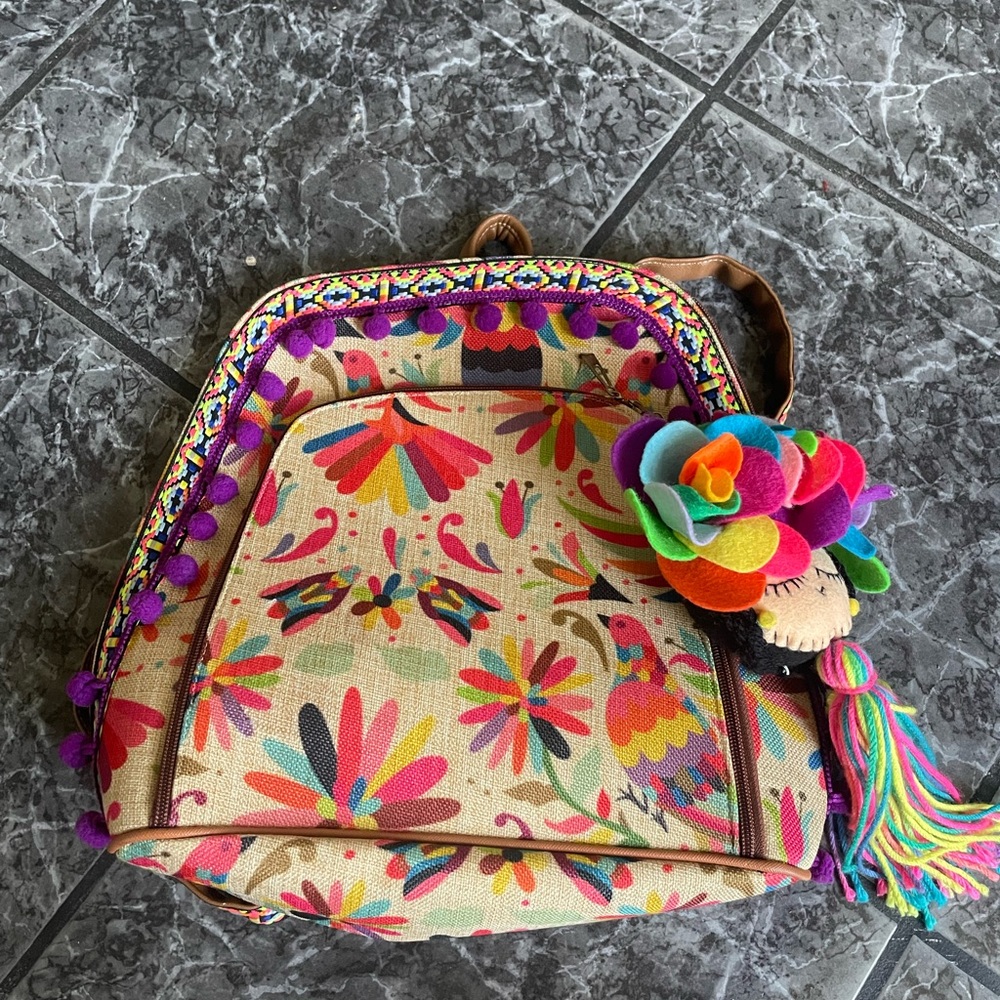 Colorful Floral Backpack with Pom Pom Details